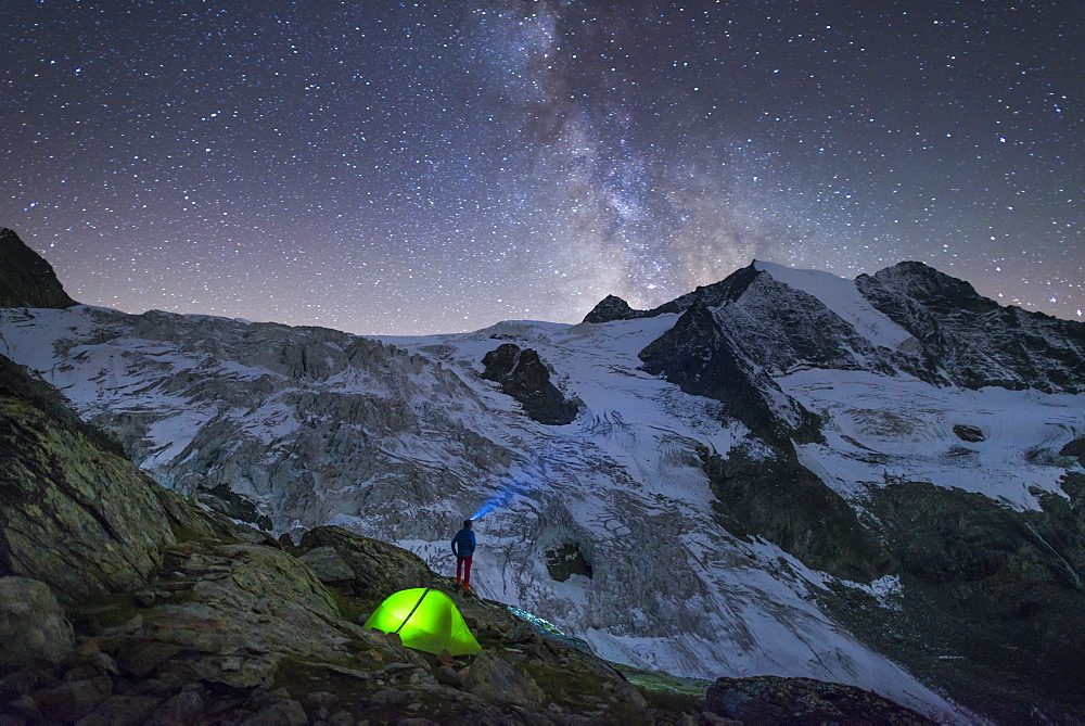 Starry sky and tent along The Walkers Haute Route from Chamonix to Zermatt, Swiss Alps, Switzerland, Europe