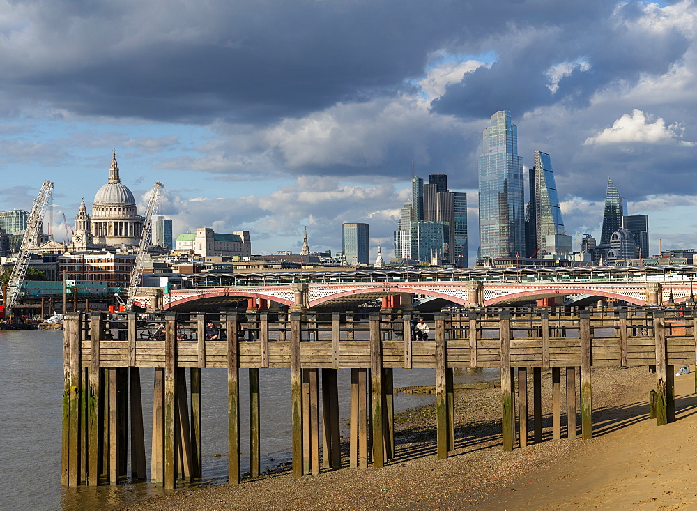 St. Pauls Cathedral and the City of London above old wooden pilings on the Southbank of the River Thames, London, England, United Kingdom, Europe