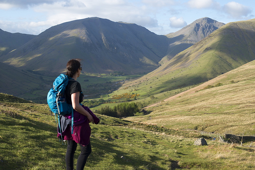 Trekking in the English Lake District in Wast Water with views of Kirk Fell and Great Gable in the distance, Lake District National Park, Cumbria, England, United Kingdom, Europe