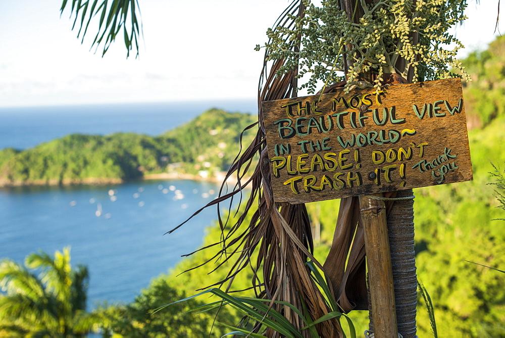 A sign asking readers not to trash the most beautiful view in the world at Castara Bay in Tobago, Trinidad and Tobago, West Indies, Caribbean, Central America