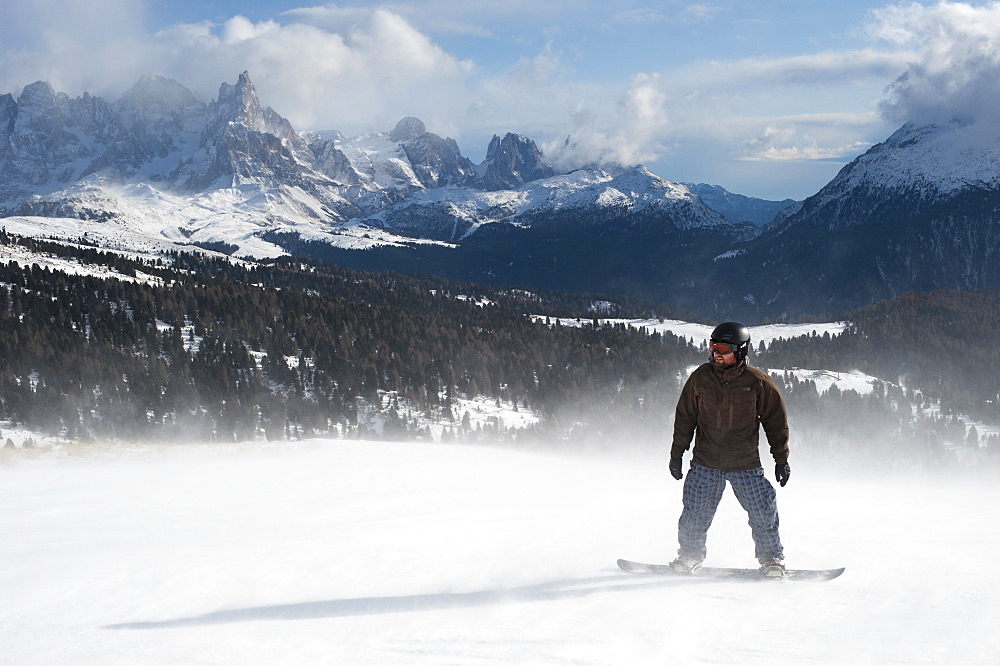 Snowboarding in Italy in the mountains near Falcade, Dolomites, Italy, Europe