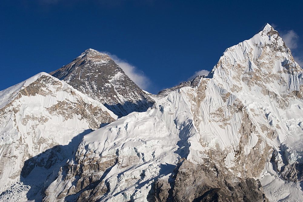 The massive black pyramid summit of Mount Everest seen from Kala Patar with Nuptse the other peak to the right, Khumbu Region, Nepal, Himalayas, Asia