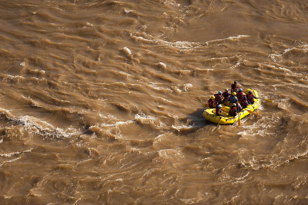 Tourists having fun rafting on the sacred River Ganges (Mother Ganga), Rishikesh, Uttarakhand (Uttaranchal), India, Asia