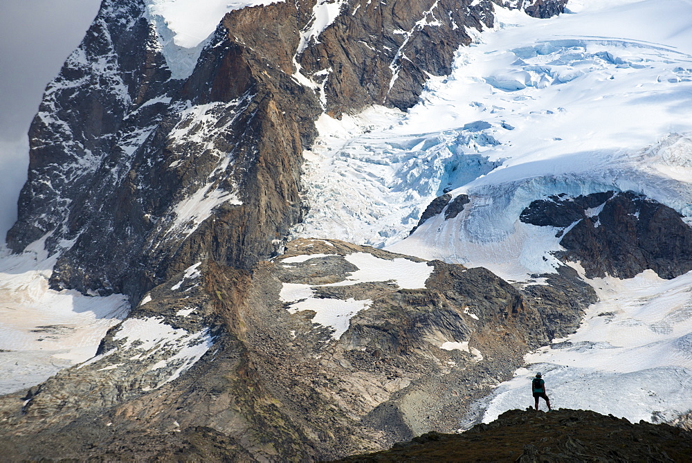 Trekking in the Swiss Alps near Zermatt with a view of Monte Rosa, Zermatt, Valais, Switzerland, Europe