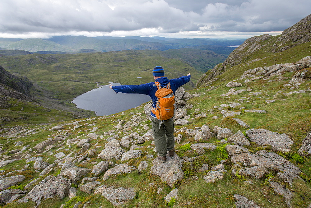 Walking in Great Langdale with a view of Stickle Tarn in the distance, Lake District National Park, Cumbria, England, United Kingdom, Europe