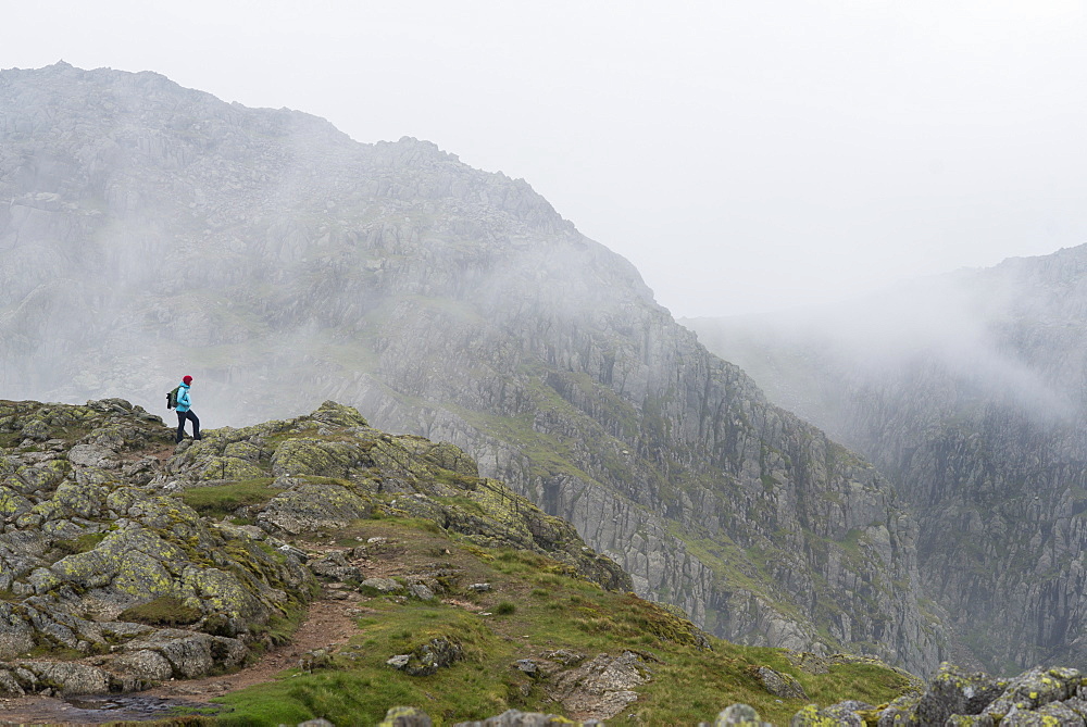 Walking across Crinkle Crags in Great Langdale, Lake District National Park, Cumbria, England, United Kingdom, Europe