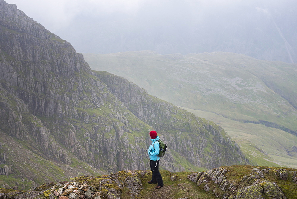 Looking down from Crinkle Craggs at the head of the Great Langdale valley on a misty day, Lake District National Park, Cumbria, England, United Kingdom, Europe