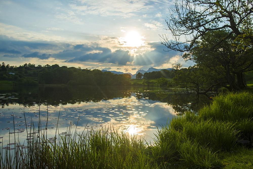 Sunset at Loughrigg Tarn near Ambleside, Lake District National Park, Cumbria, England, United Kingdom, Europe