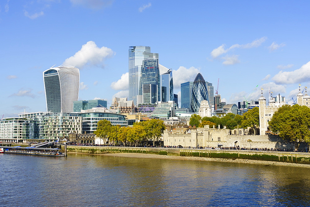 City of London skyscrapers and the Tower of London viewed across the River Thames, London, England, United Kingdom, Europe