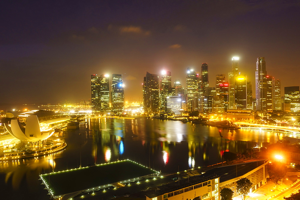 The towers of the Central Business District and Marina Bay by night, Singapore, Southeast Asia, Asia