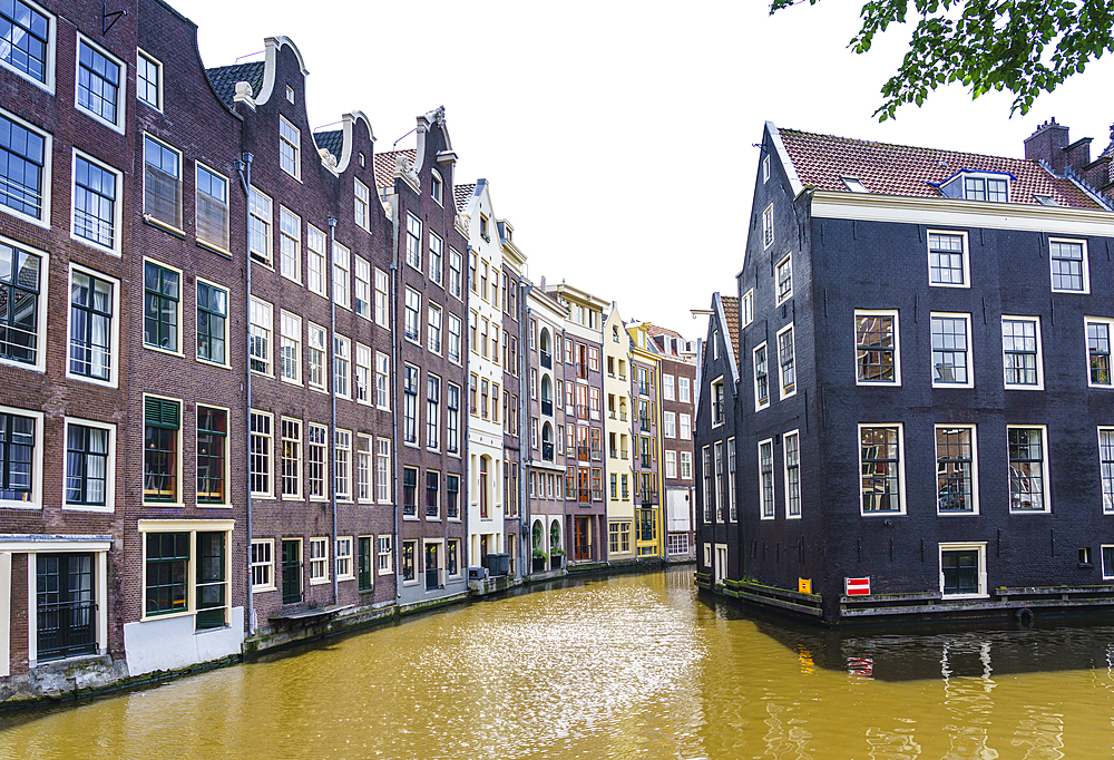 Old gabled buildings by a canal, Oudezijds Kolk, Amsterdam, North Holland, The Netherlands, Europe