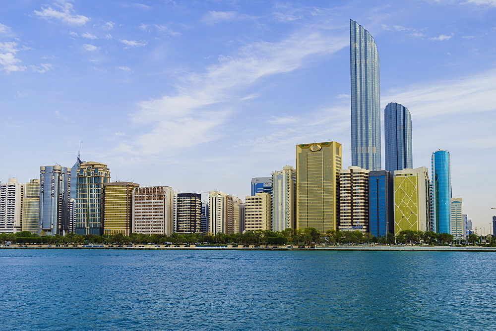 Skyscrapers in the Al Markaziyah district and Corniche viewed from the Gulf, Abu Dhabi, United Arab Emirates, Middle East