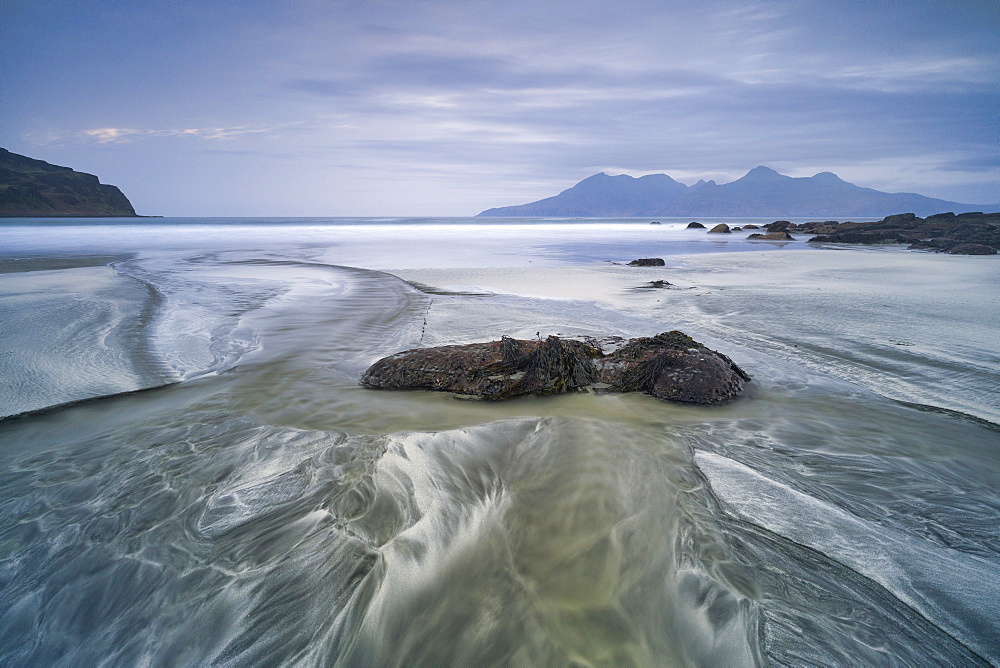 The Isle of Rhum from Laig Bay, Cleadale, Isle of Eigg, Small Isles, Inner Hebrides, Scotland, United Kingdom, Europe