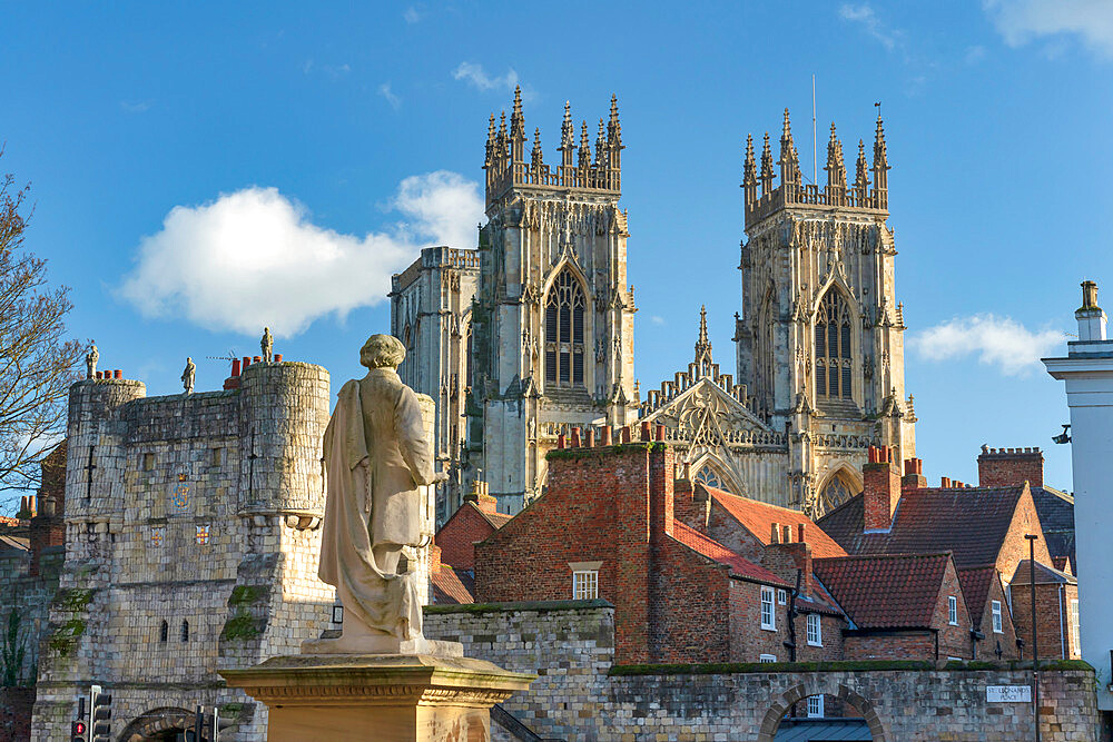 York Minster West Bell Towers and Bootham Bar from St. Leonards Place, York, North Yorkshire, England, United Kingdom, Europe