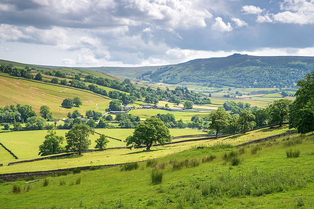 Appletreewick village and the River Wharfe with distant Simon's Seat in Wharfedale, The Yorkshire Dales, Yorkshire, England, United Kingdom, Europe