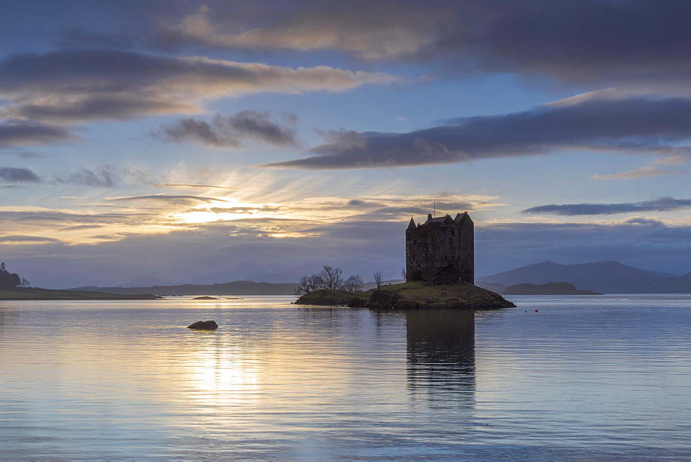 Mid-winter sunset over Loch Linnhe and Castle Stalker in winter, Argyll and Bute, Scotland, United Kingdom, Europe