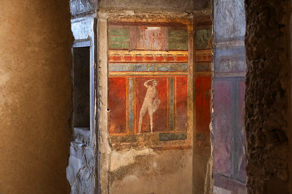 Wall murals in the archeological ruins of Pompeii. A UNESCO World Heritage site. Italy, Europe.