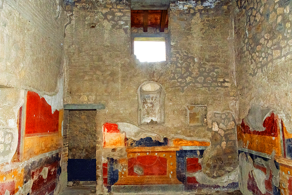 Preserved murals within the archeological ruins of Pompeii. Italy, Europe.