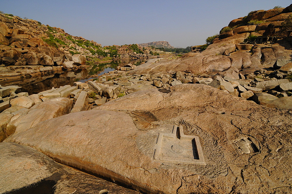 Tungabhadra River and stone cut Shiva Linga, Hampi, Karnataka, India, Asia