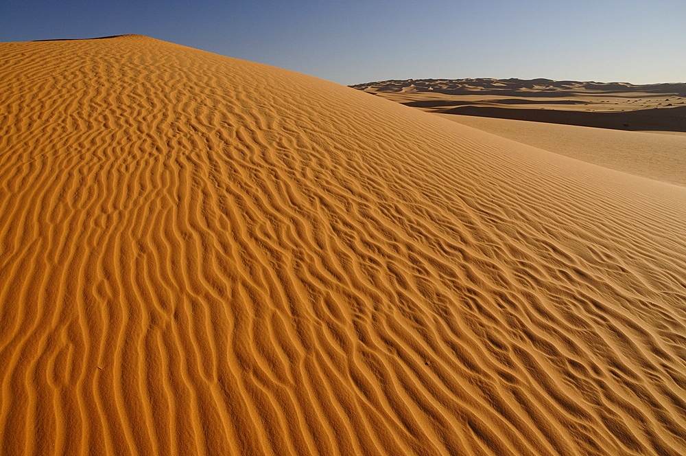 Picturesque orange Dunes of Ubari, Sahara Desert, Libya, North Africa, Africa