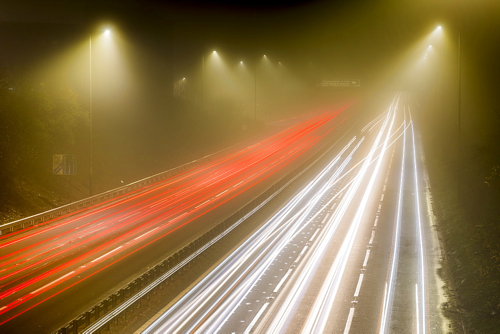 Motorway traffic trail lights at night, M8, Scotland, United Kingdom, Europe