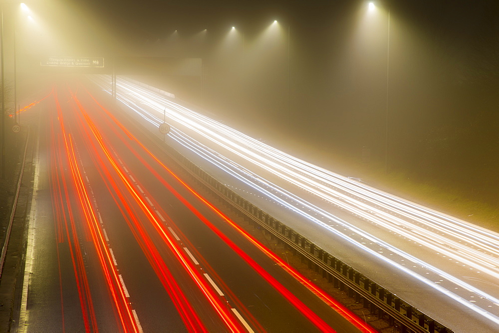 Motorway traffic trail lights at night, M8, Scotland, United Kingdom, Europe