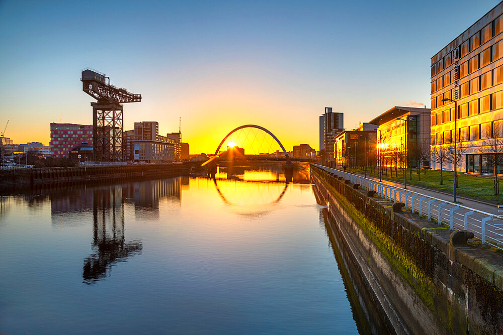 Sunrise over River Clyde, Finnieston Crane, Clyde Arc (Squinty Bridge), River Clyde, Glasgow, Scotland, United Kingdom, Europe