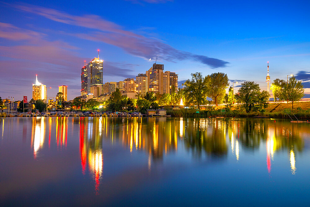 City Skyline at dusk, River Danube, Alte Donau, Vienna, Austria, Europe