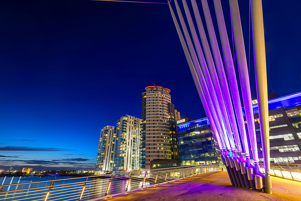 Media City footbridge at dusk, Media City UK, Salford Quays, Greater Manchester, England, United Kingdom, Europe