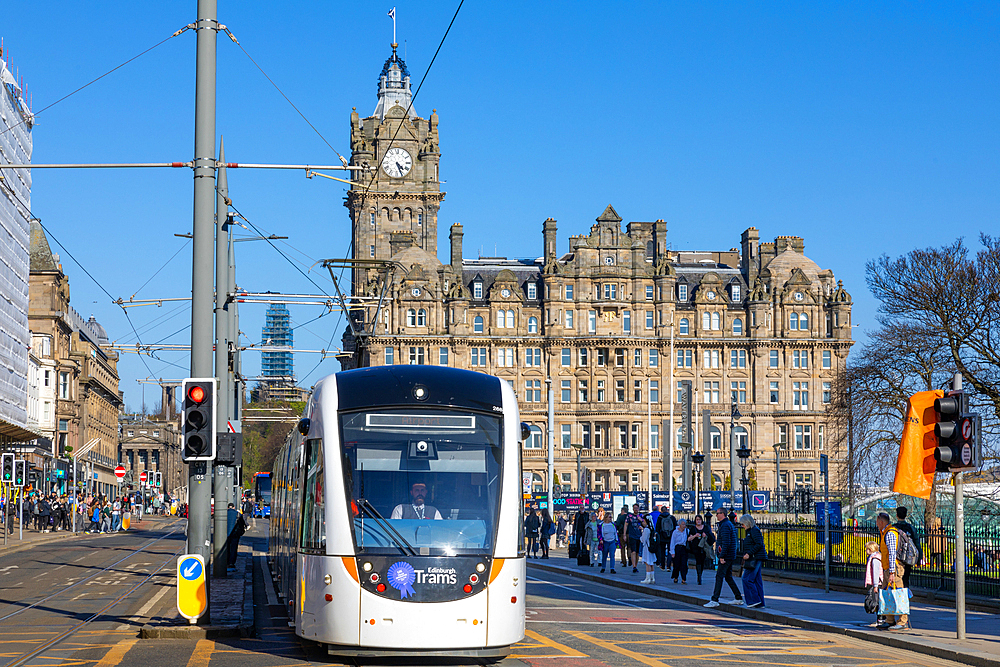 Edinburgh Tram in front of the Balmoral Hotel, Princes Street, Edinburgh, Scotland, United Kingdom, Europe