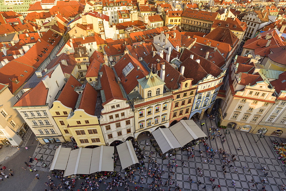 View of Prague's historic Old Town Square from Old Town Hall with rooftops and pedestrians below, UNESCO World Heritage Site, Prague, Czech Republic, Europe