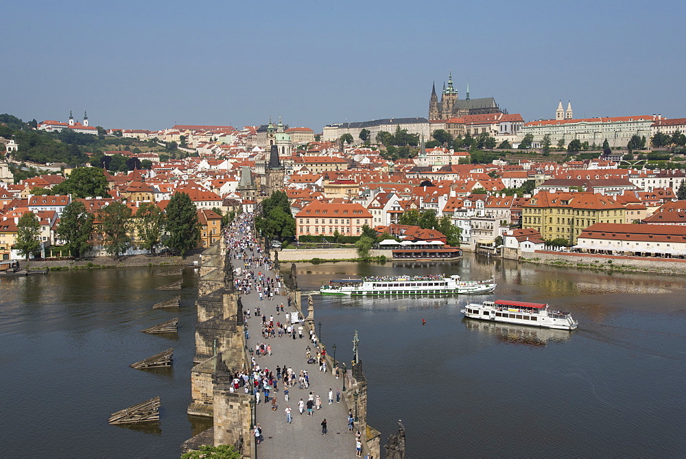 View of Charles Bridge from Old Town Bridge Tower looking toward Mala Strana and Prague Castle, UNESCO World Heritage Site, Prague, Czech Republic, Europe