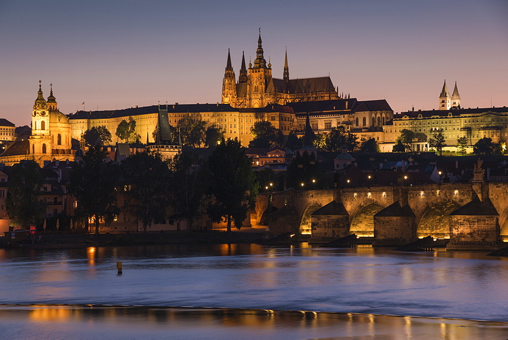 Prague Castle, Charles Bridge, Mala Strana, and the Vltava River at twilight, UNESCO World Heritage Site, Prague, Czech Republic, Europe