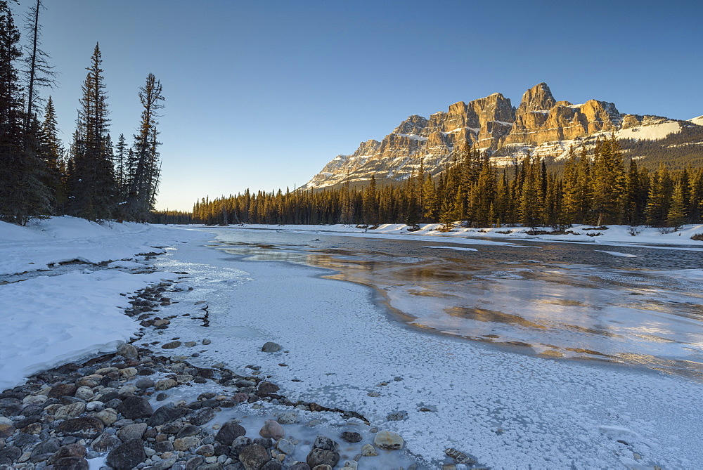 Sunset at Castle Mountain with frozen Bow River in winter, Banff National Park, UNESCO World Heritage Site, Alberta, Canadian Rockies, Canada, North America