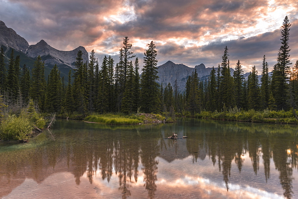 Sunset over Ha Ling Peak and Mount Rundle at Policeman's Creek, Canmore, Alberta, Canada, North America