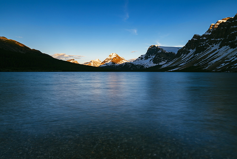 Calm sunset at Bow Lake, Banff National Park, UNESCO World Heritage Site, Alberta, Canadian Rockies, Canada, North America