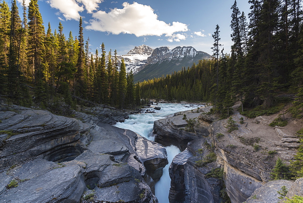 Mistaya Canyon waterfalls at sunset with evening light and Mount Sarbach, Banff National Park, UNESCO World Heritage Site, Alberta, Canadian Rockies, Canada, North America