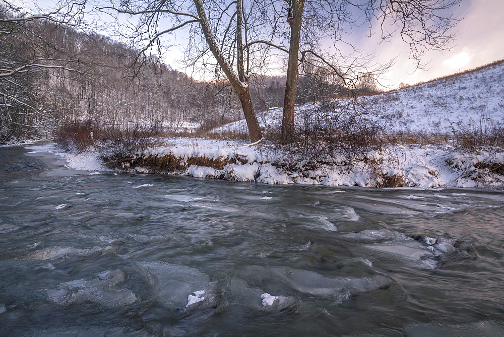 Snow covered landscape and icy river, Blue Ridge Mountains, North Carolina, United States of America, North America