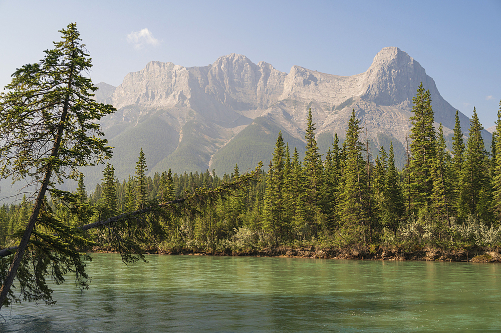 The Bow River and Ha Ling Peak in wildfire smoke, Canmore, Canadian Rockies, Alberta, Canada, North America