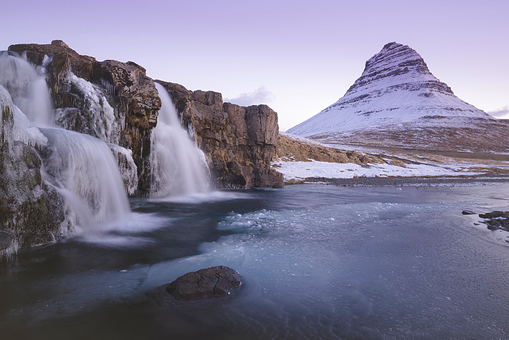 Sunrise at Kirkjufellsfoss and Kirkjufell Mountain, Snaefellsnes Peninsula, Iceland, Polar Regions