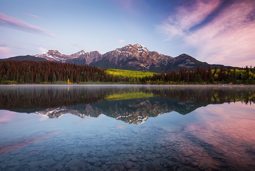 Pyramid Mountain reflected in Patricia Lake in autumn at sunrise, Jasper National Park, UNESCO World Heritage Site, Canadian Rockies, Alberta, Canada, North America