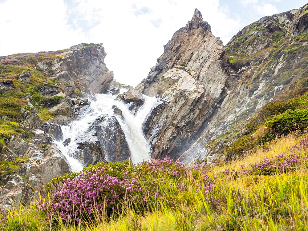 Mountain waterfall in the Alps of the Stubai Valley (Stubaital), Tyrol, Austria, Europe