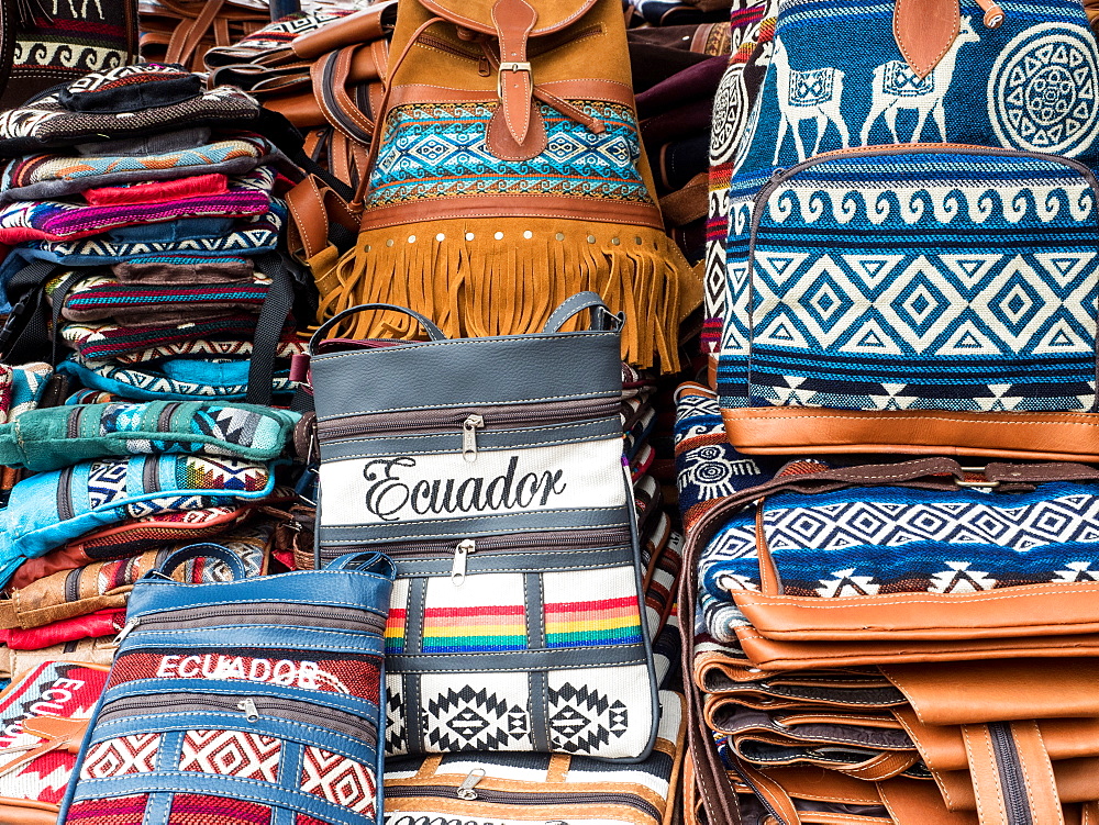 Tourist goods for sale, craft market, Plaza de los Ponchos, Otavalo, Ecuador, South America