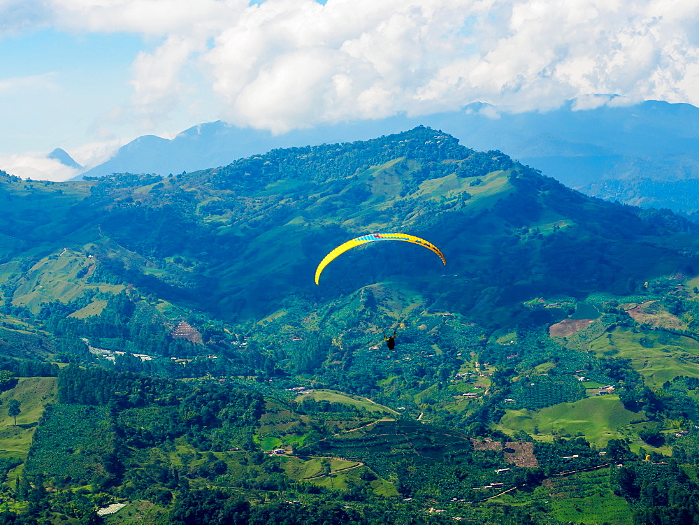 Paraglider soars near Jardin, Antioquia, Colombia, South America