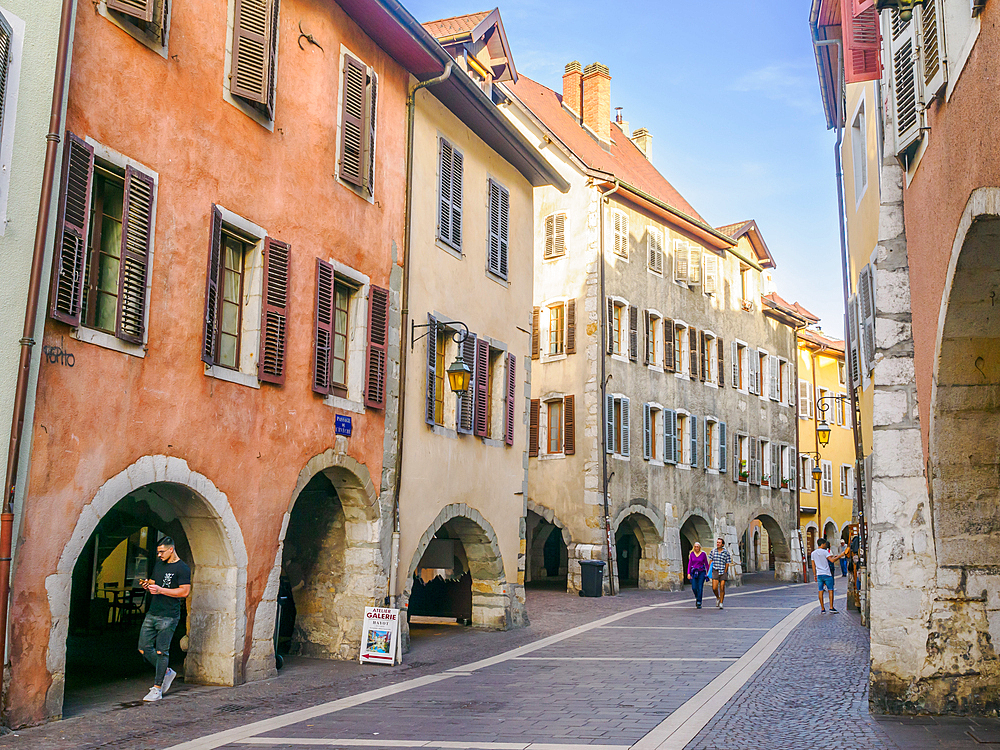 Medieval buildings with covered passages line streets in the old center of Annecy, Annecy, Haute-Savoie, France, Europe