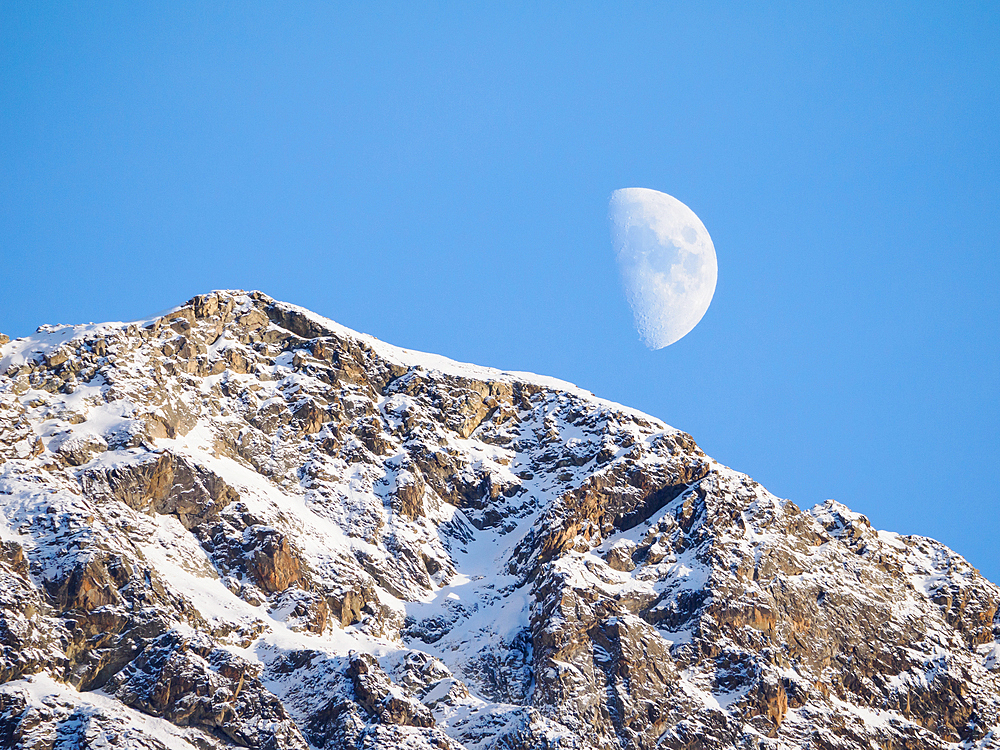 Moonrise behind Corvatsch peak, Switzerland, Europe