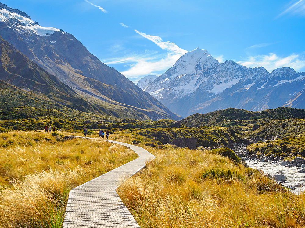 Boardwalk on the Hooker Valley Track and Aoraki (Mount Cook) in the distance, Southern Alps, South Island, New Zealand, Pacific