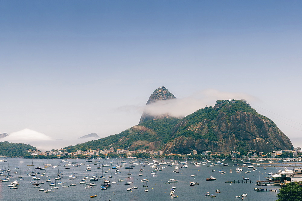 Sugarloaf Mountain, known locally as Pao de Acucar, covered in fog, Rio de Janeiro, Brazil, South America