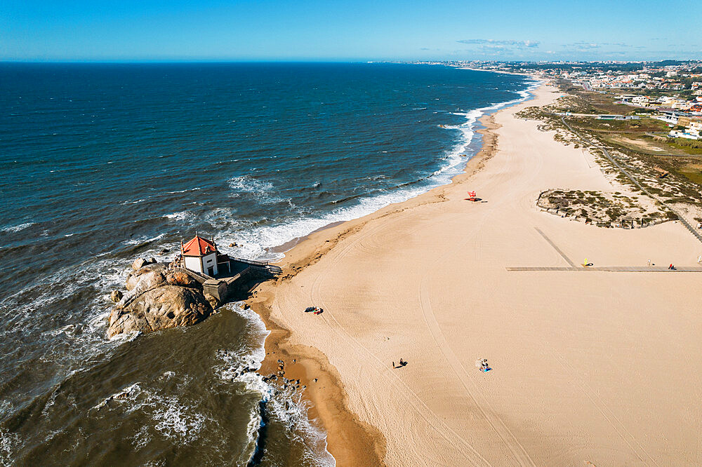 Aerial view of Senhor da Pedra, an 18th century Baroque chapel on Miramar Beach, northern Portugal, Europe