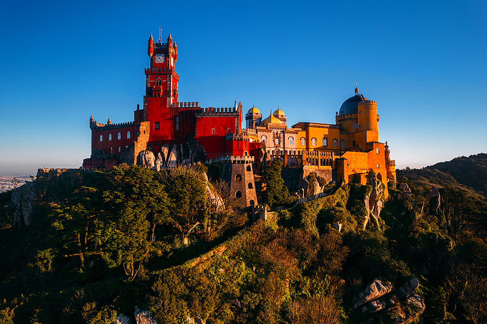 Aerial drone view of Pena Palace, UNESCO World Heritage Site, a romanticist castle in the Sintra mountains, Portugal, Europe